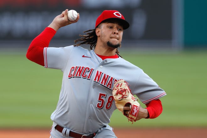 Cincinnati Reds pitcher Luis Castillo throws against the Detroit Tigers in the first inning of a baseball game in Detroit, Friday, July 31, 2020. (AP Photo/Paul Sancya)