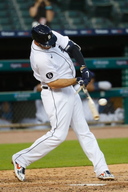 Detroit Tigers' C.J. Cron breaks his bat in the sixth inning of a baseball game against the Cincinnati Reds on Friday.
