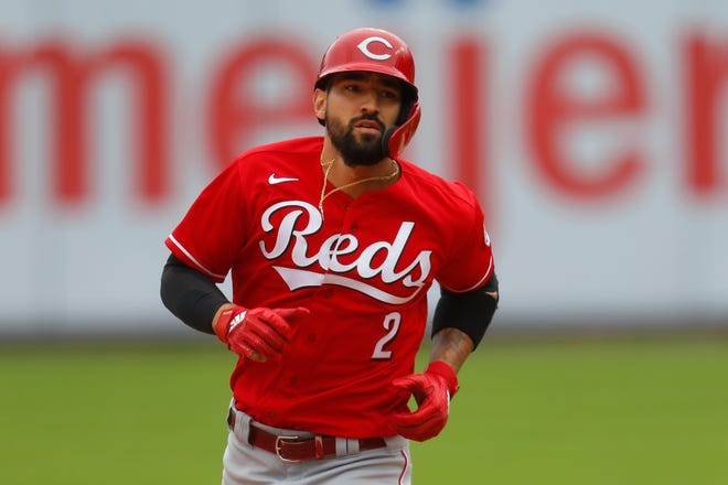 The Cincinnati Reds' Nick Castellanos rounds the bases after hitting a two-run home run against the Detroit Tigers in the first inning of the first baseball game of a doubleheader Sunday, Aug. 2, 2020, in Detroit.