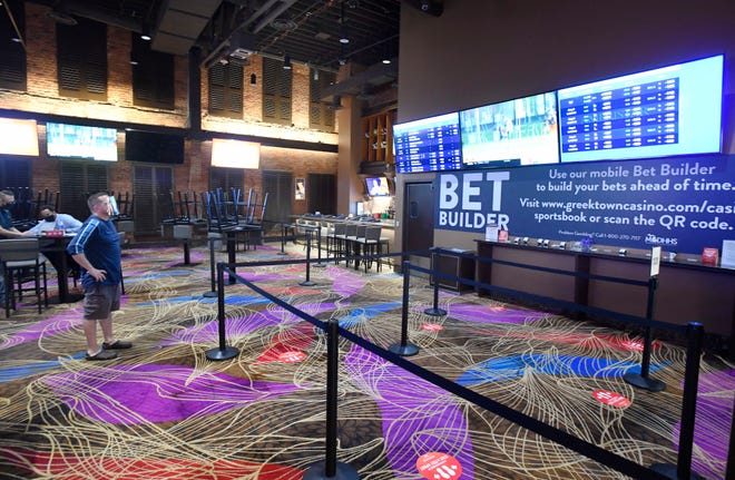 The Greektown sports book will have 6-foot social distancing stickers as well as plexiglass between employees and customers.