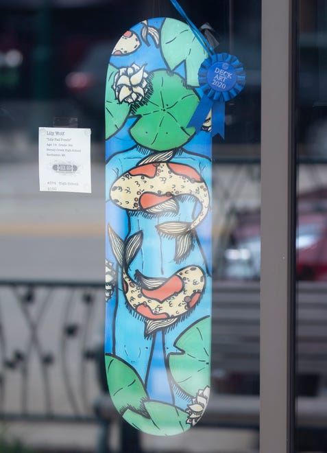 "Lily Pad Ponds" by Lily Wolf, 14, of Rochester won the high school category.  The skateboard art pieces are displayed in Rochester businesses store front windows and shops for visitors to view as they walk downtown.