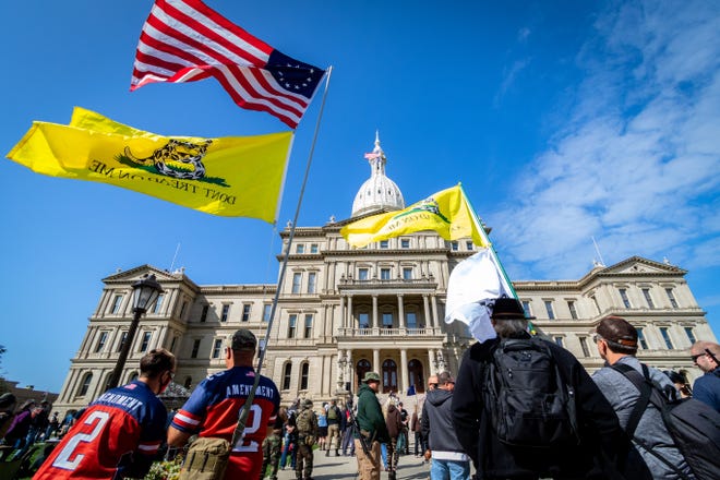 Gun rights advocates rally for the Second Amendment March at the Capitol Building in Lansing, Michigan on September 17, 2020.