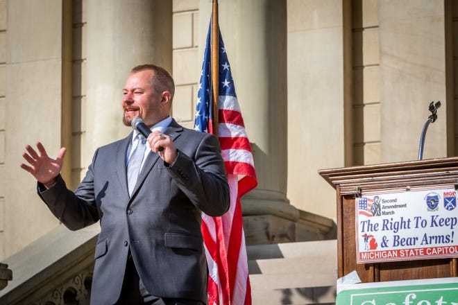 Co-owner of Freedom Firearms in Battle Creek, Michigan Joel Fulton emcees the Second Amendment March at the Capitol Building in Lansing, Michigan on September 17, 2020.