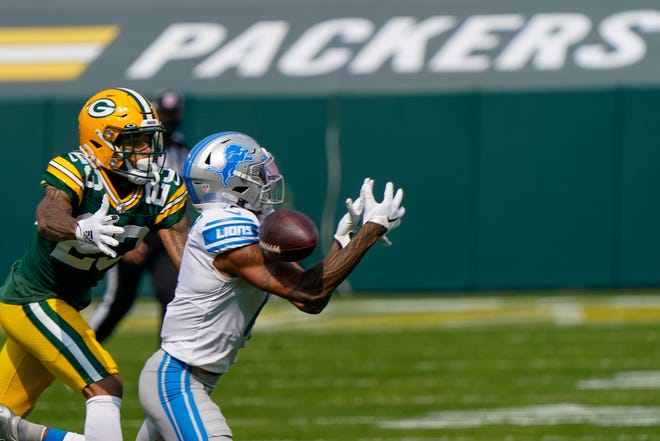 Green Bay Packers' Jaire Alexander breaks up a pass intended for Detroit Lions' Marvin Jones during the first half of an NFL football game Sunday, Sept. 20, 2020, in Green Bay, Wis.