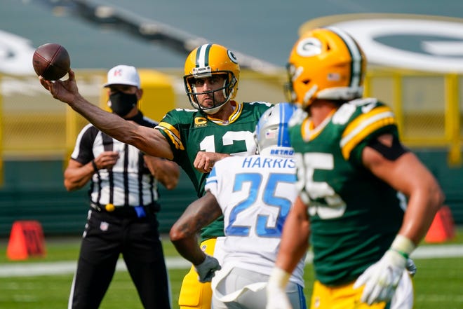 Green Bay Packers' Aaron Rodgers throws during the second half of an NFL football game against the Detroit Lions Sunday, Sept. 20, 2020, in Green Bay, Wis.