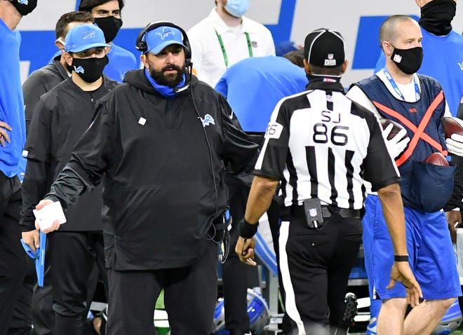 Lions head coach Matt Patricia talks with an official in the fourth quarter.