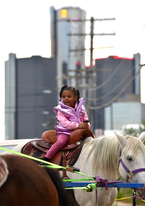 Tai'raz's aunt Timauri Clavon rides 'Grace,' an eight-year-old pony quarterhorse at the Chamberlin Pony Rides and Petting Zoo.