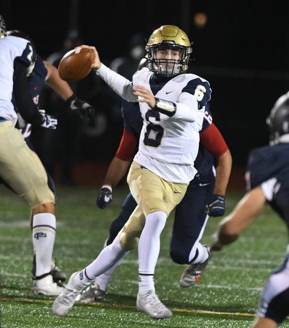 Grosse Pointe South quarterback Benard Anthony looks for an open receiver in the first half.