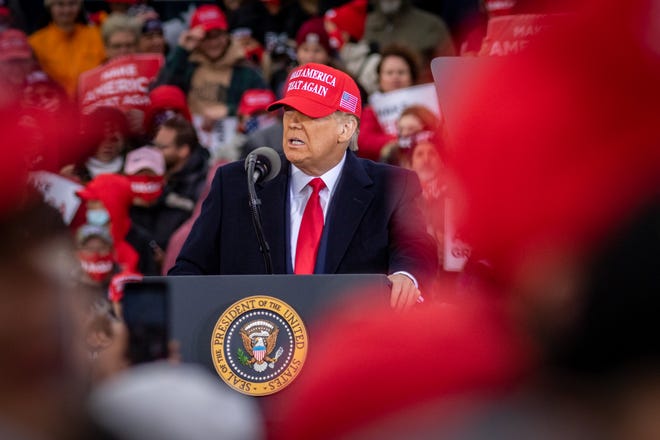 U.S. President Donald Trump speaks to supporters at a rally at Muskegon County Airport in Muskegon on Oct. 17, 2020.