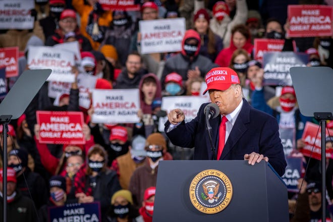 U.S. President Donald Trump speaks at a rally at Muskegon County Airport in Muskegon on Oct. 17, 2020.