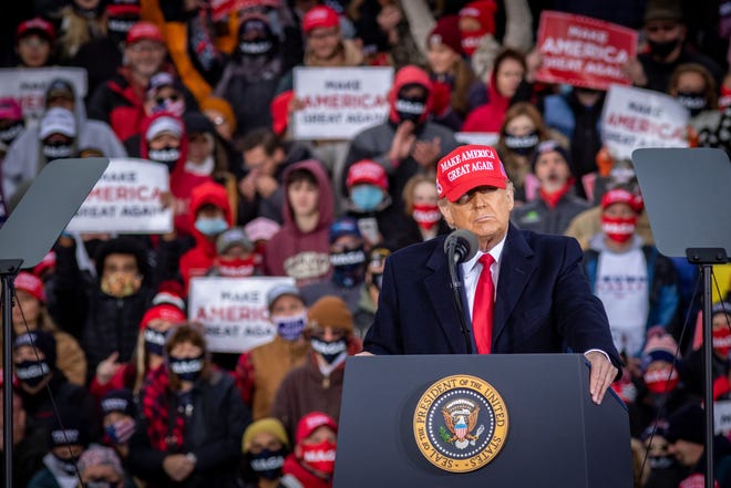 President Donald Trump speaks to supporters at a rally at Muskegon County Airport in Muskegon on Oct. 17, 2020.
