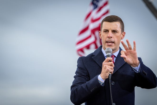 Michigan House Speaker Lee Chatfield addresses the crowd before President Donald Trump speaks at a rally at Muskegon County Airport in Muskegon on Oct.17, 2020.