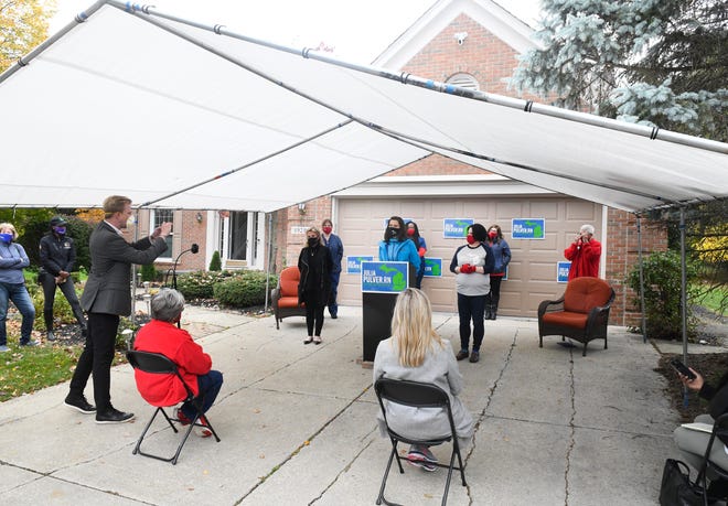Michigan Governor Gretchen Whitmer, Julia Pulver, Candidate for 39th House District and Debbie Dingell, U. S Representative for Michigan's 12th District, during a press conference in West Bloomfield Township, Michigan on October 18, 2020.