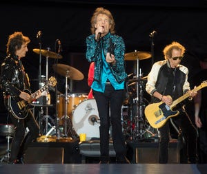 Mick Jagger, center, Keith Richards, right, and Ronnie Wood, left, of the Rolling Stones perform during the "No Filter" tour in Oro-Medonte, Ontario, on June 29, 2019.