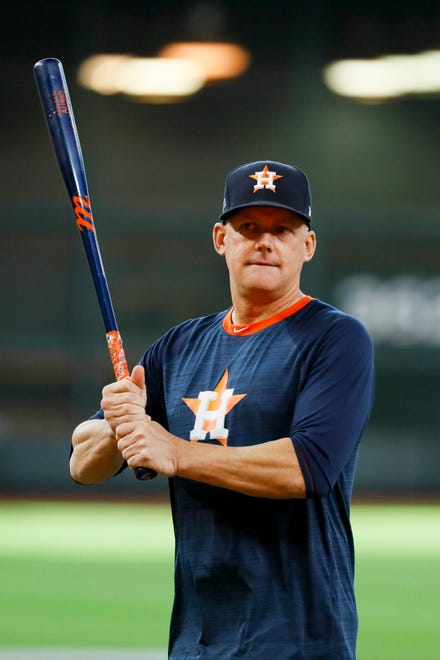Houston Astros manager AJ Hinch watches batting practice before Game 2 of baseball's American League Championship Series against the New York Yankees Sunday, Oct. 13, 2019, in Houston.(AP Photo/Matt Slocum)