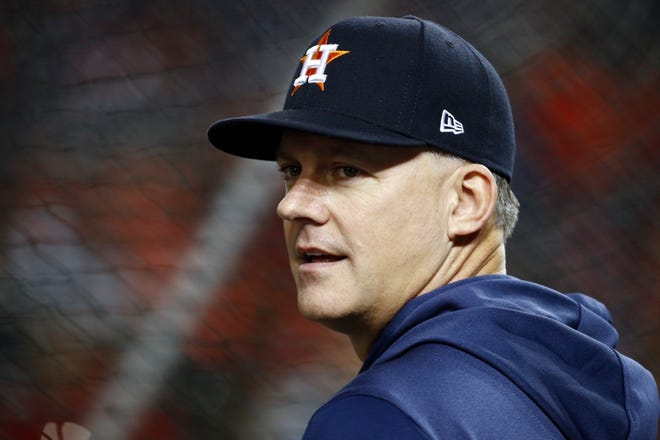 Houston Astros manager AJ Hinch watches batting practice before Game 4 of the baseball World Series against the Washington Nationals Saturday, Oct. 26, 2019, in Washington. (AP Photo/Patrick Semansky)