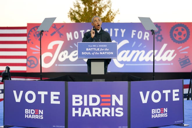 Former President Barack Obama speaks at a rally at Belle Isle Casino in Detroit, Mich., Saturday, Oct. 31, 2020, also attended by Democratic presidential candidate former Vice President Joe Biden.