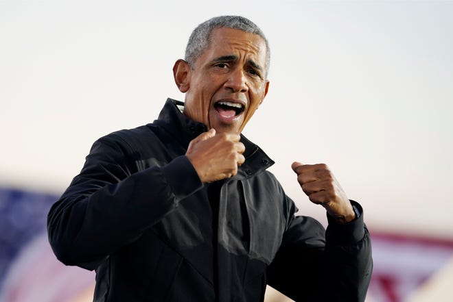 Former President Barack Obama speaks at a rally at Belle Isle Casino in Detroit, Mich., Saturday, Oct. 31, 2020, also attended by Democratic presidential candidate former Vice President Joe Biden.