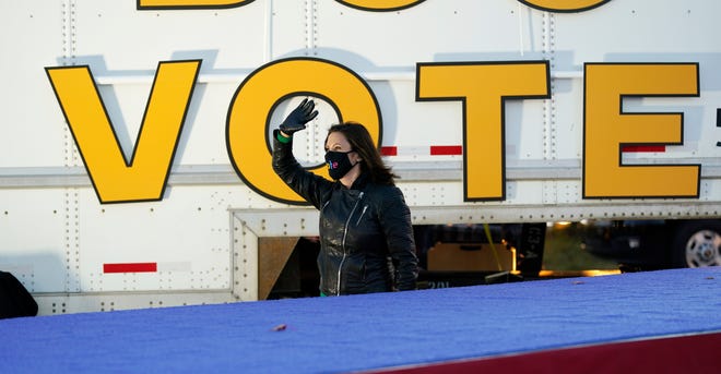 Gov. Gretchen Whitmer, D-Mich., waved before Democratic presidential candidate former Vice President Joe Biden and former President Barack Obama speak at a rally at Belle Isle Casino in Detroit, Mich., Saturday, Oct. 31, 2020.
