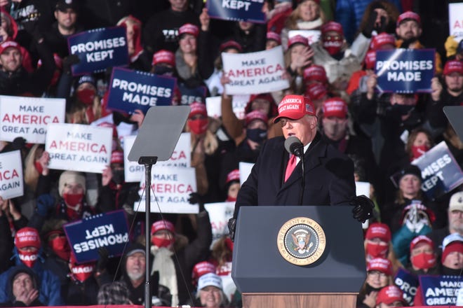 President Donald Trump speaks at a campaign rally in Traverse City, Mich. Monday, Nov. 2, 2020.