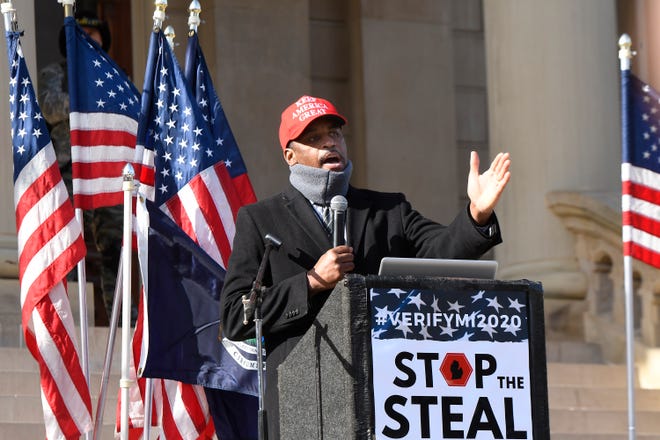 Pastor Philip Smith of the Eternal Word Church (Grandville) speaks as President Donald Trump  supporters gather at the state Capitol Building  in Lansing for a "Stop the Steal" rally disputing the presidential voting Saturday, October 14, 2020.