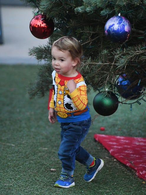 Henry Ketner, 5 explores the "Children's Tree" before its lighting in Beacon Park. 
Beacon Park is illuminated with more than 125, 000 twinkling LED lights including the "Children's Tree" now through January 10th in Detroit, Michigan  on November 20, 2020.