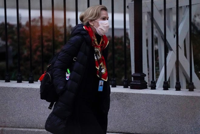 Dr. Deborah Birx, White House coronavirus response coordinator, leaves the White House Tuesday, Dec. 1, 2020, in Washington.
