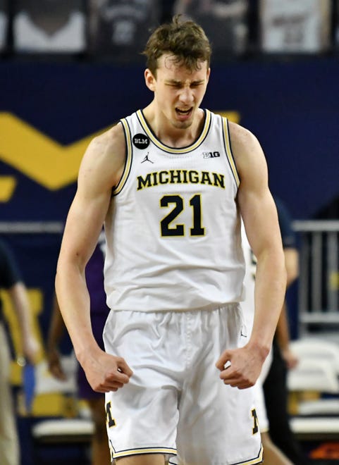 Michigan guard Franz Wagner (21) reacts in the second half.