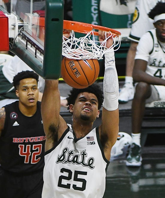 Michigan State's Malik Hall slams home two points in the second half.