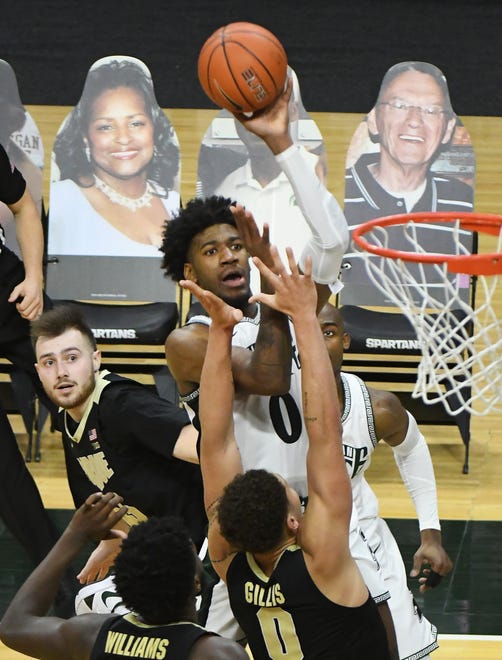 Michigan State's Aaron Henry puts up the final shot of the game, missing its mark and preserving the one-point Purdue victory, 55-54 at the Breslin Center in E. Lansing, Michigan on January 8, 2020.
