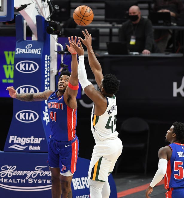 Pistons' Saddiq Bey defends the shot of Jazz's Donovan Mitchell in the fourth quarter.