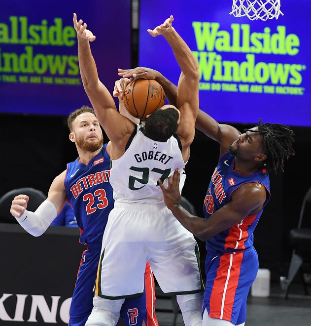 Pistons' l-r, Blake Griffin and Isaiah Stewart blocks the shot of Jazz's Rudy Gobert in the fourth quarter.