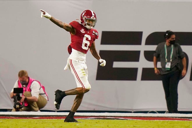 Alabama wide receiver DeVonta Smith celebrates after scoring against Ohio State during the first half.