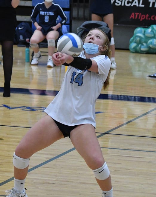 Skyline's Jordan Hall gets under the ball in the fifth game.