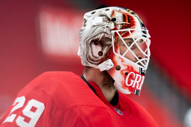 Detroit goaltender Thomas Greiss takes a breather in the second period during a game between the Detroit Red Wings and the Carolina Hurricanes, at Little Caesars Arena, in Detroit, January 14, 2021.