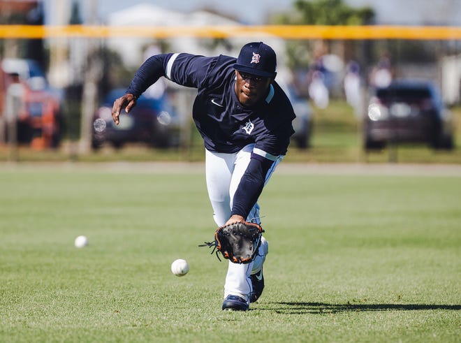 Tigers outfielder Daz Cameron fields a ground ball in Lakeland, Florida on February 22, 2021.