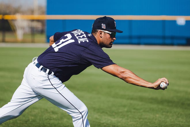 Tigers outfielder prospect Riley Greene barehands a ball in Lakeland, Florida on February 22, 2021.