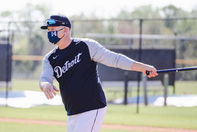 Tigers manager AJ Hinch hits grounds balls in Lakeland, Florida on February 22, 2021.