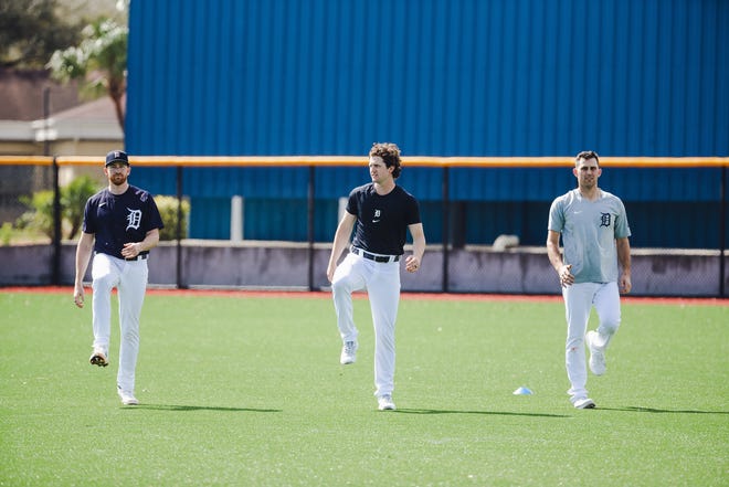 From left, Spencer Turnbull, Casey Mize and Matthew Boyd warm up in Lakeland, Florida on February 22, 2021.
