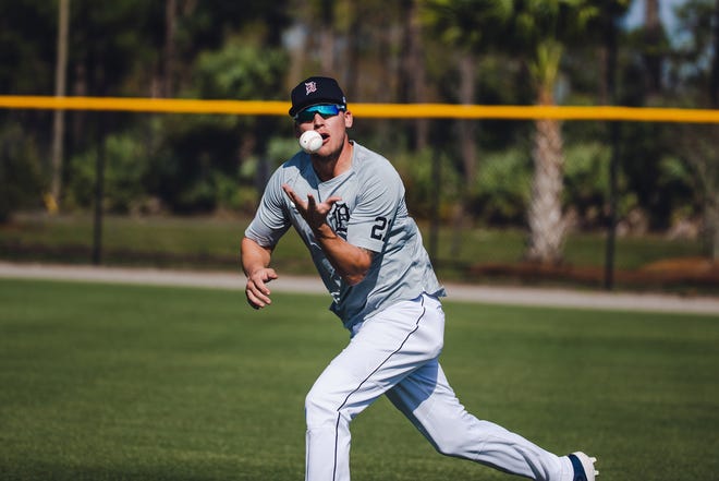 Tigers outfielder JaCoby Jones barehands a ball in Lakeland, Florida on February 22, 2021.