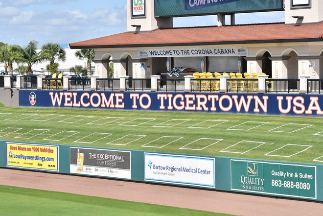 Squares are painted on the berm to keep people safely distanced apart for the coronavirus protocols during games which begin tomorrow at the Detroit Tigers workout at Joker Marchant Stadium in Lakeland, Fla. on Feb. 27, 2021.