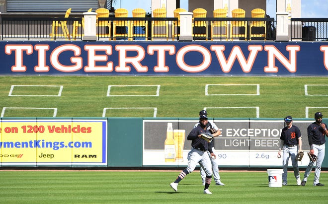 Tigers outfielder Akil Baddoo throws the ball during workout at Joker Marchant Stadium in Lakeland, Florida, on on Feb. 27, 2021.