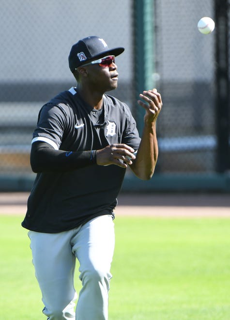 Tigers outfielder Daz Cameron makes a barehanded catch during drills at the Detroit Tigers workout at Joker Marchant Stadium in Lakeland, Fla. on Feb. 27, 2021.