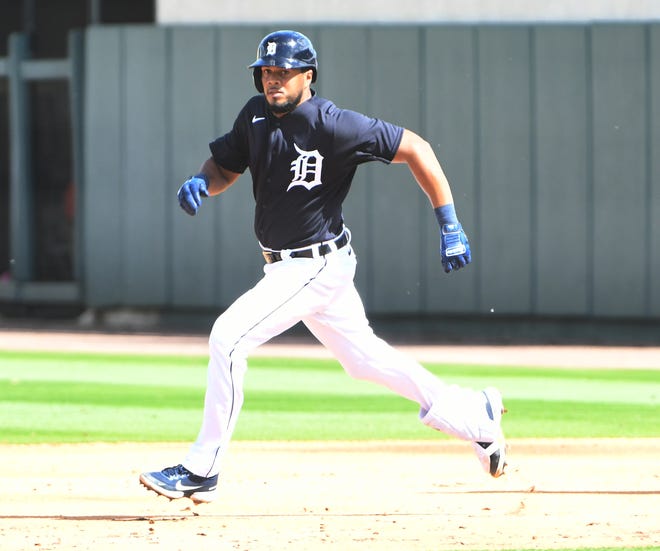 Tigers' Jeimer Candelario heads to second on his double in the third inning.