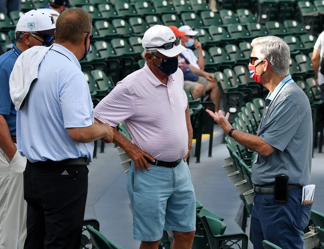 Phillies president of baseball operations Dave Dombrowski, right, talks with former Tigers manager Jim Leyland, second from left, with, from left, Tigers executive vice president, baseball operations and general manager Al Avila and vice president and assistant general manager David Chadd.  Detroit Tigers vs Philadelphia Phillies at Joker Marchant Stadium in Lakeland, Fla. on Feb. 28, 2021.  Tigers win, 10-2.