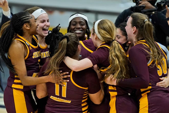 Central Michigan players celebrate after winning the MAC championship.