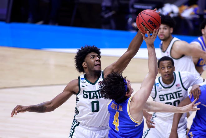 Aaron Henry (0) of the Michigan State Spartans blocks the shot of Jaime Jaquez Jr. (4) of the UCLA Bruins during the second half.