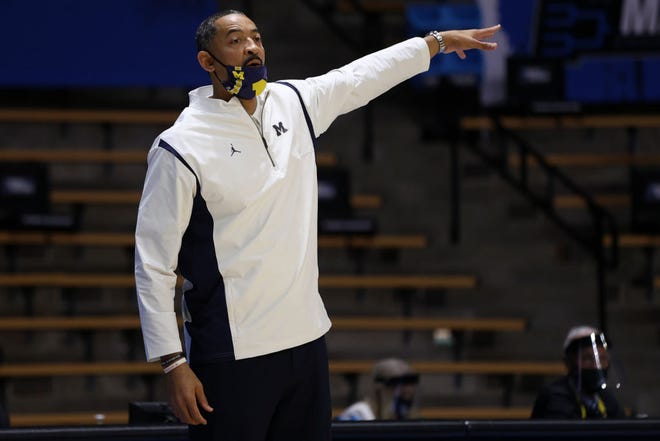Head coach Juwan Howard of the Michigan Wolverines gestures during the first half.