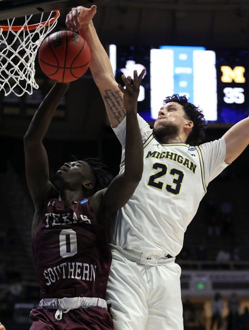 Yahuza Rasas (0) of the Texas Southern Tigers has his shot blocked by Brandon Johns Jr. (23) of the Michigan Wolverines during the first half.