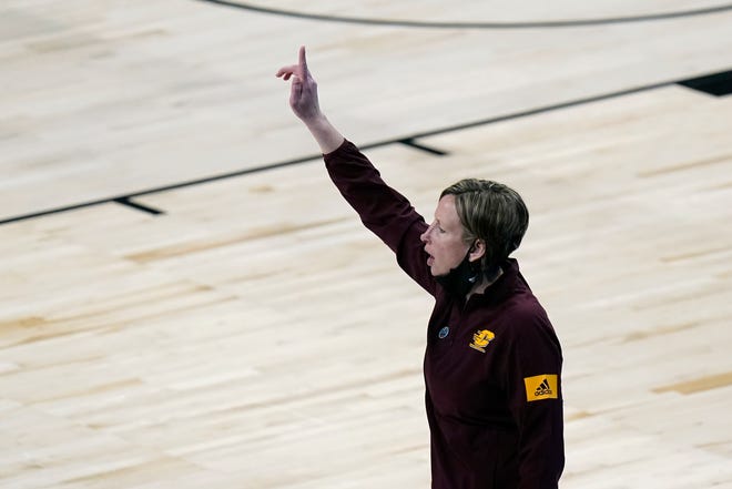 Central Michigan head coach Heather Oesterle directs her team during the first half.